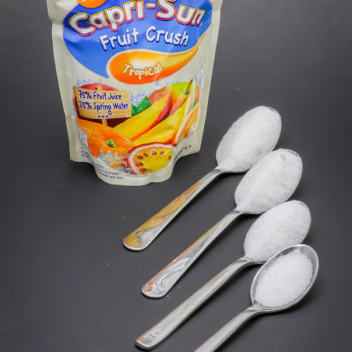 1 Capri-Sun tropical contient 3,2 cuil. à café de sucre soit 16g