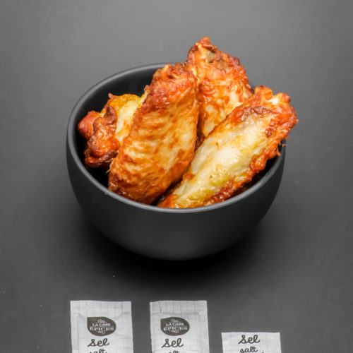 5 chicken wings de Quick contiennent 2,6 dosettes de sel soit 2,1g