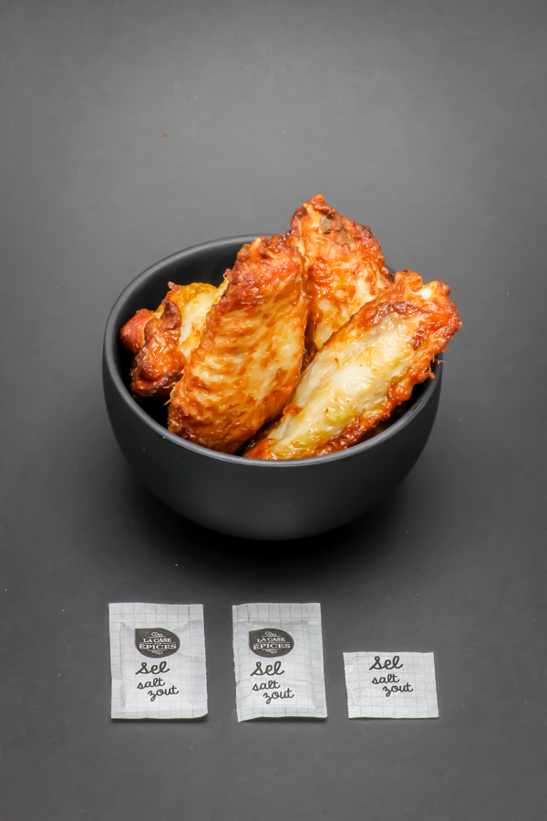 5 chicken wings de Quick contiennent 2,6 dosettes de sel soit 2,1g